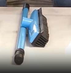 Cepillo,escoba de goma para pelo de animales.